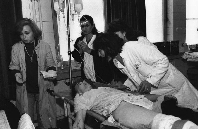 A civilian woman, wounded by Serb mortar fire, at the emergency ward of a hospital. Sarajevo. 1993.