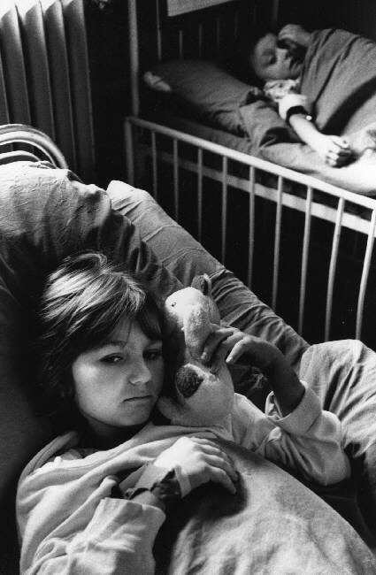 At the Kosevo hospital, children are treated for wounds sustained during a Serbian mortar attack on their school. A teacher and three children were killed, 21 wounded. Having lived in the city, Serbian forces who besiege Sarajevo are expected to know the exact location of every institution. Later Bosnian Serb leader Radovan Karadzic claimed the shells were coming from Croat lines which are out of reach of mortar shells. Sarajevo. 1993.