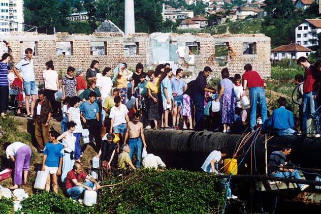 People stand iqueue for drinking water in Sarajevo, Bosnia And Herzegovina, 9 July 1995. EPA/ANJA NIEDRINGHAUS