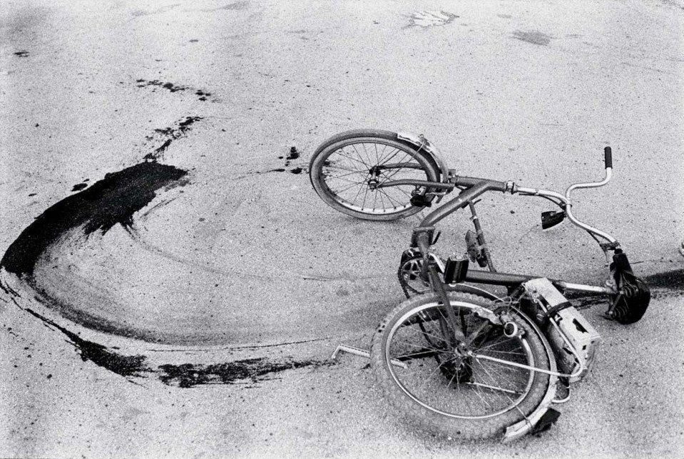 'Bloody Bicycle' Fallen bicycle of teenage boy just killed by a sniper. Sarajevo, 1993.