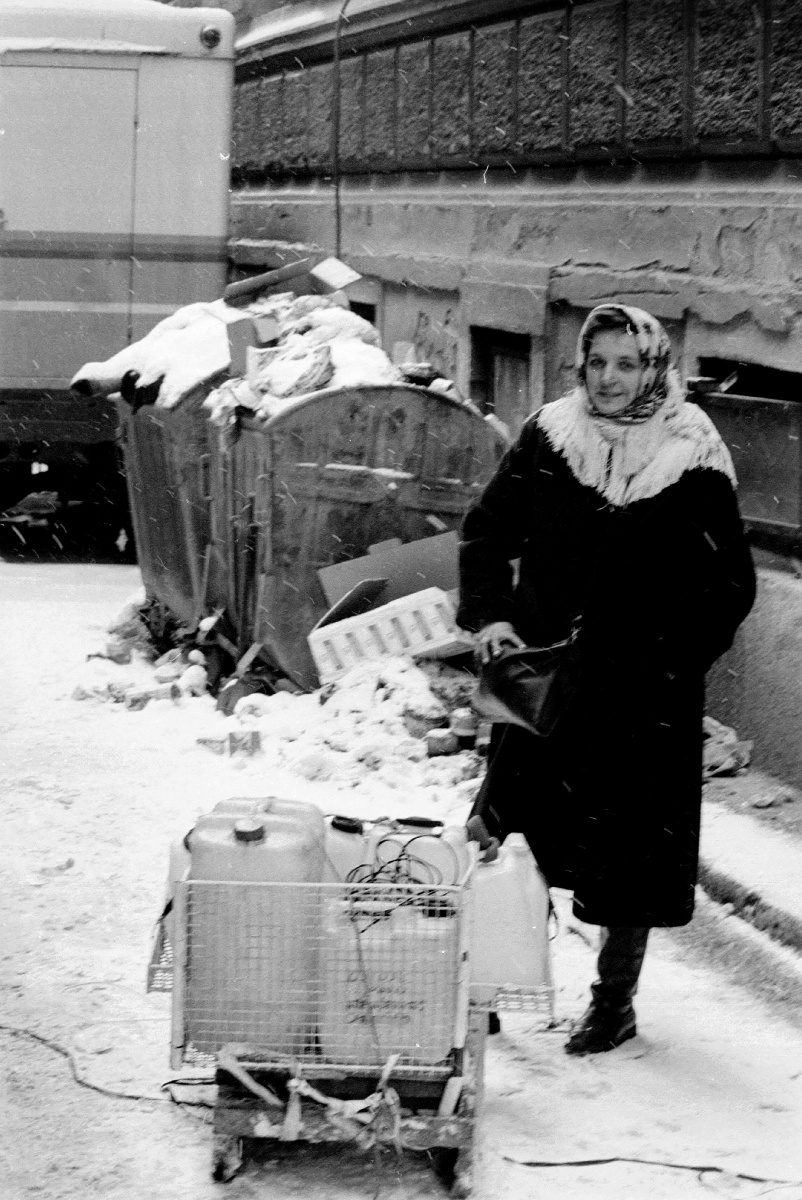 Fetching water as a light snow falls. Water retrieval means long walks dragging the cumbersome loads while exposed to sniper fire.