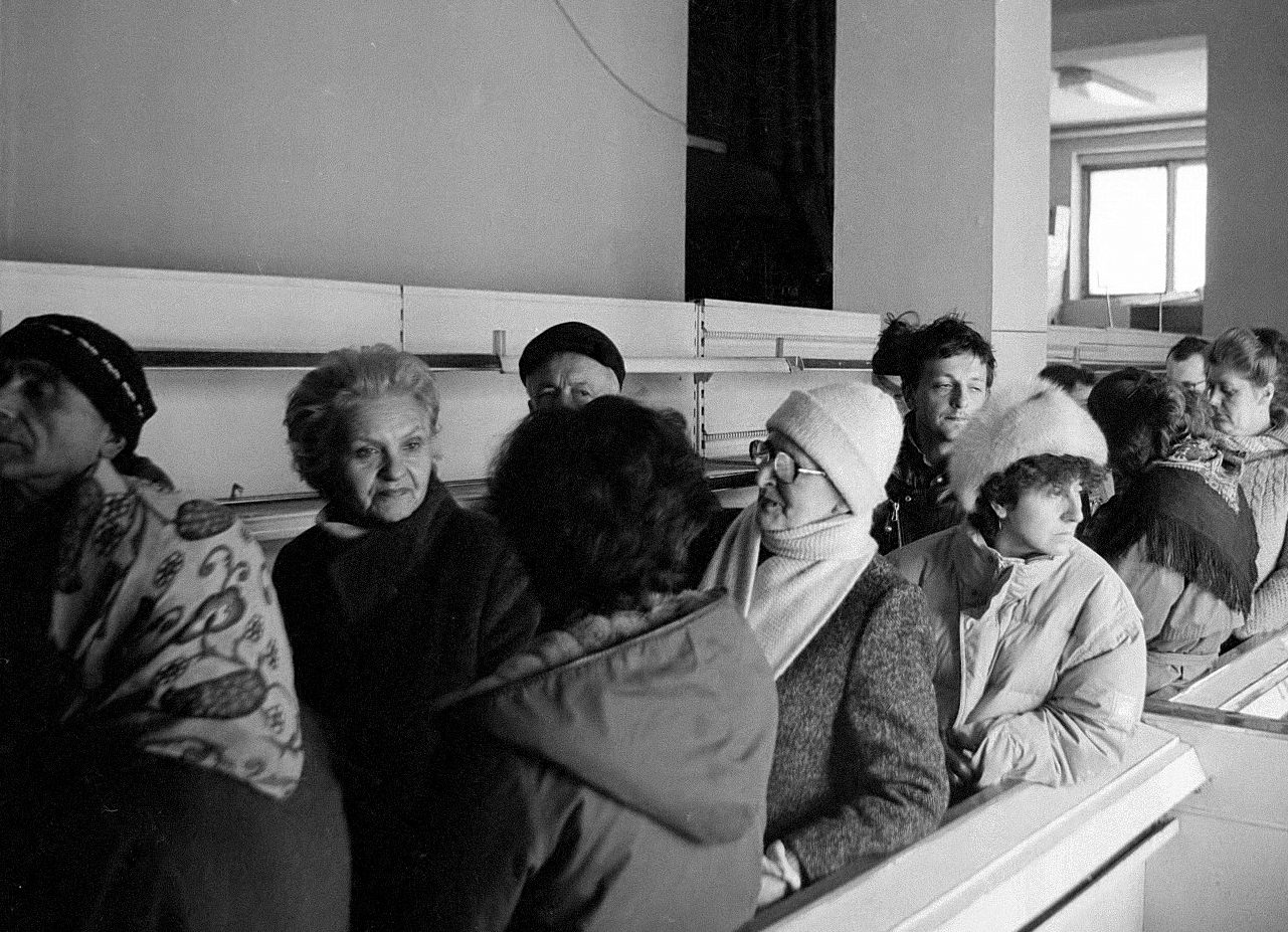 In front of empty shelves in an ice-cold shop, Sarajelis wait in line for meagre handouts from a newly arrived UNHCR shipment -- a little rice, a little flour, a little rapeseed oil, a little powdered milk, a couple of K rations.