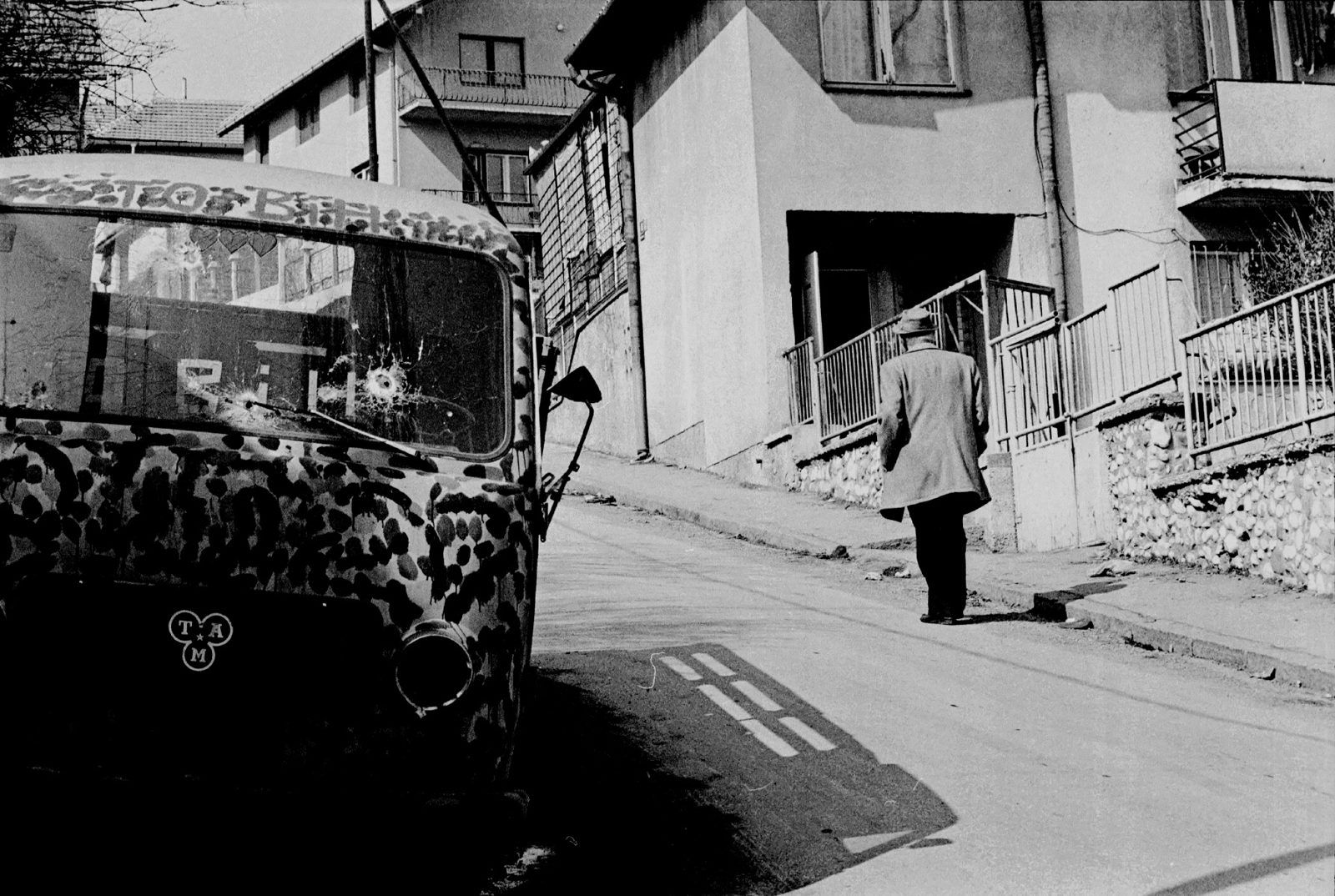 Up to Novi Sarajevo. At his own insistance, and in the face of considerable risk, my interview subject today, Mehmed Fehimovic, a feature film editor (he has worked with Visconti) before the war trapped him, has met me downtown to guide me on the long walk up to his apartment, Ulica Ante Bakotica 31/4, in Novi Sarajevo.