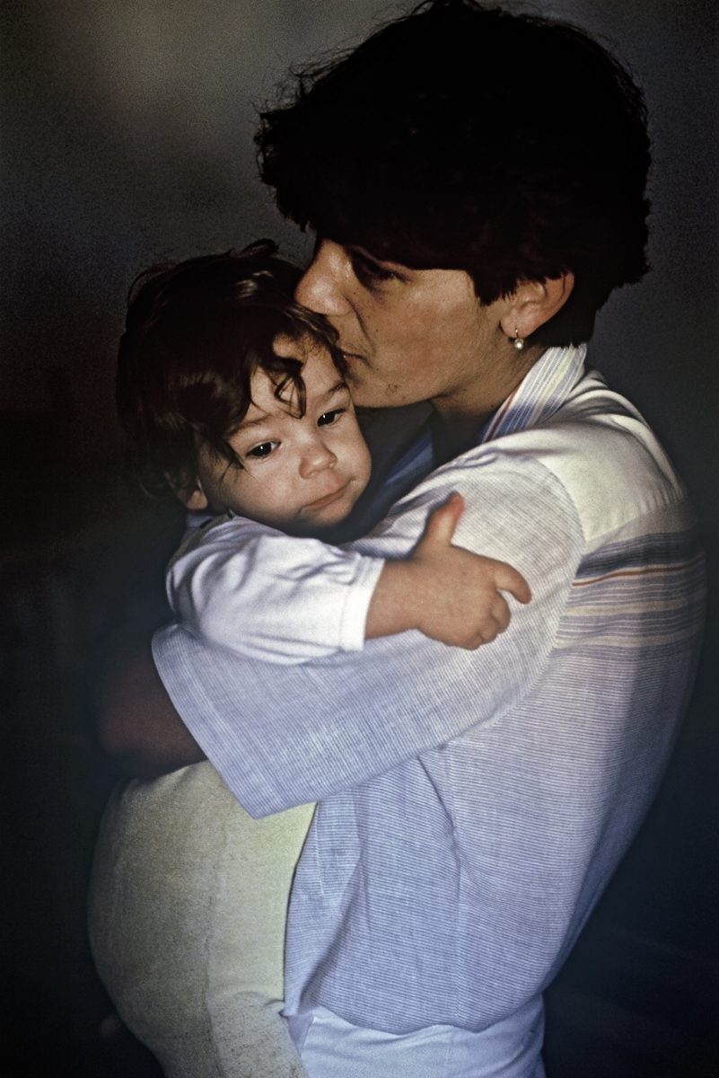 In the toddler group in the orphanage of 'Ljubica Ivezic', a caregiver caresses one of the children. Bosnia and Herzegovina, Sarajevo 30.07.1992