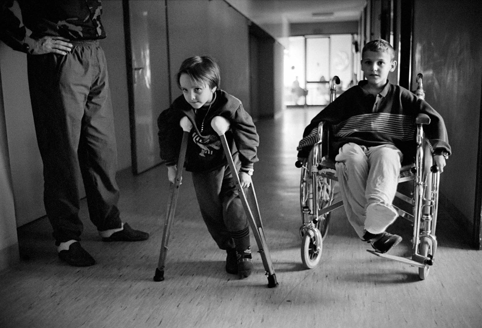 Children injured during the war moving along the corridors of Kosevo Hospital in Sarajevo, 14 November 1995.