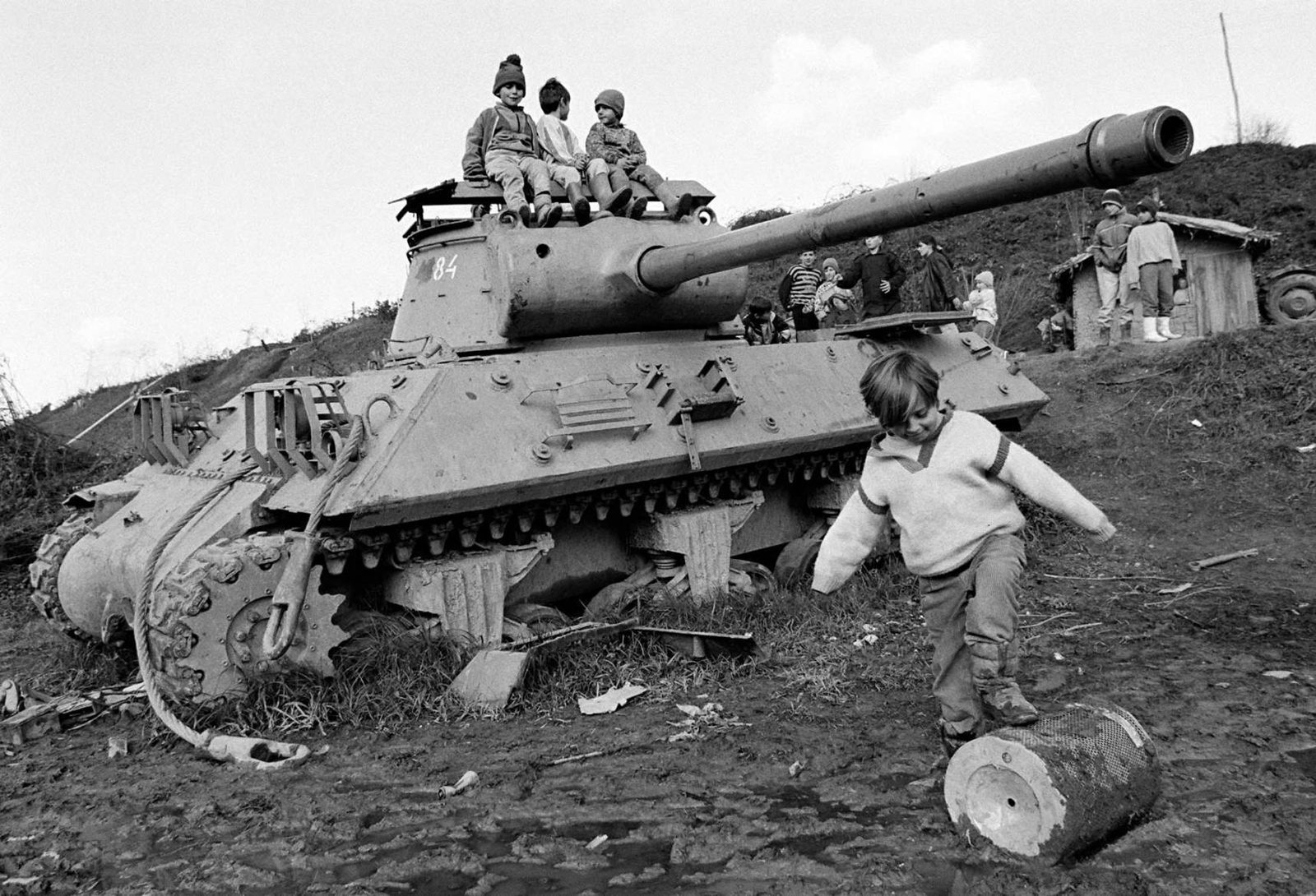 Children playing on a destroyed army tank in a village near Gorazde, 12 November 1995.