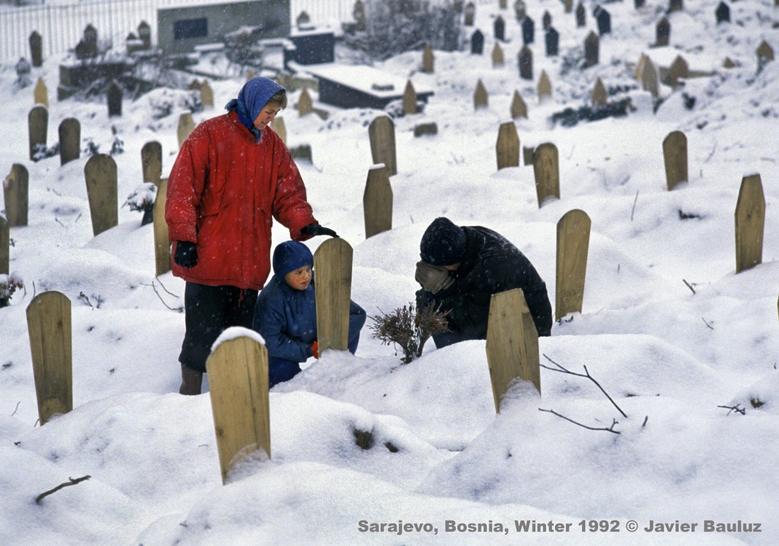 A Bosnian family mourns the death of a relative killed in a Serb attack. Sarajevo Bosnia and Herzegovina, Winter 1992.