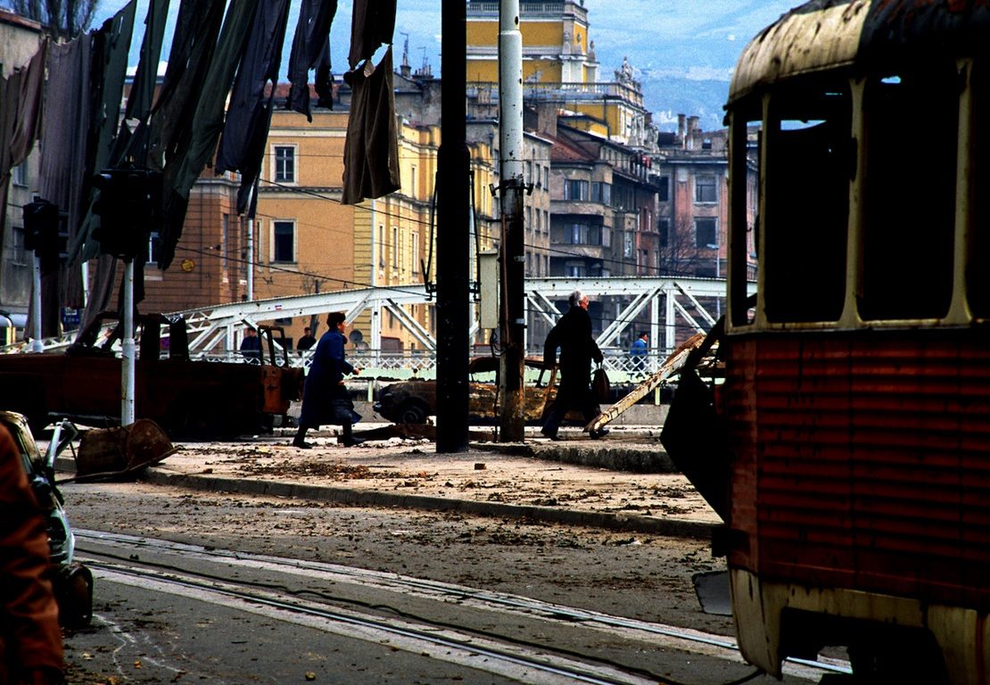 Dangerous crossroad in Skenderija under snipers’ fire. Sarajevo, Bosnia and Herzegovina, 1994