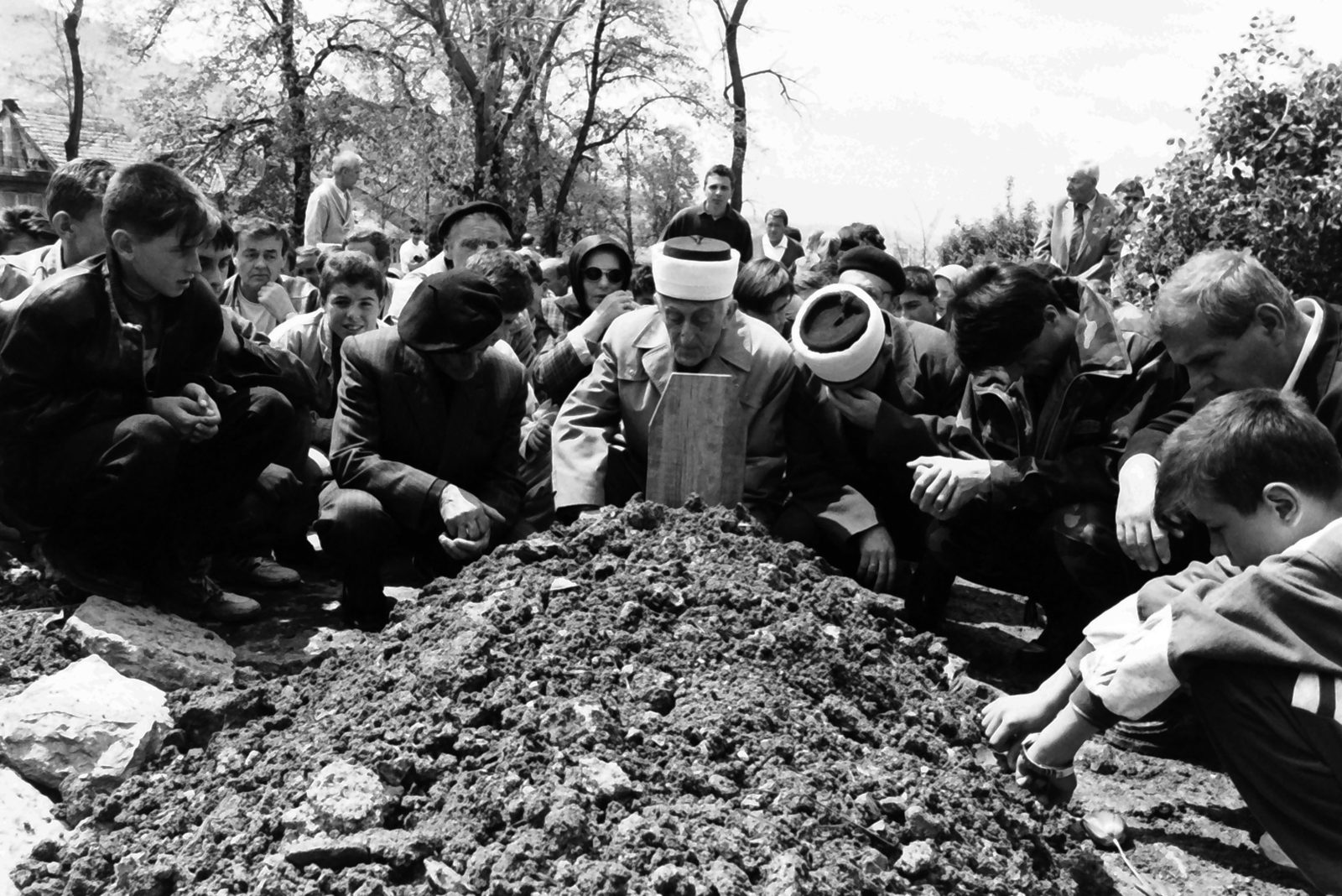 Funeral of a sixteen year old Amel Hodzic who was killed by a Serb sniper while playing tennis with his friend. 6 May 1995, Martyrs' Cemetery Kovači - Sarajevo, Bosnia and Herzegovina