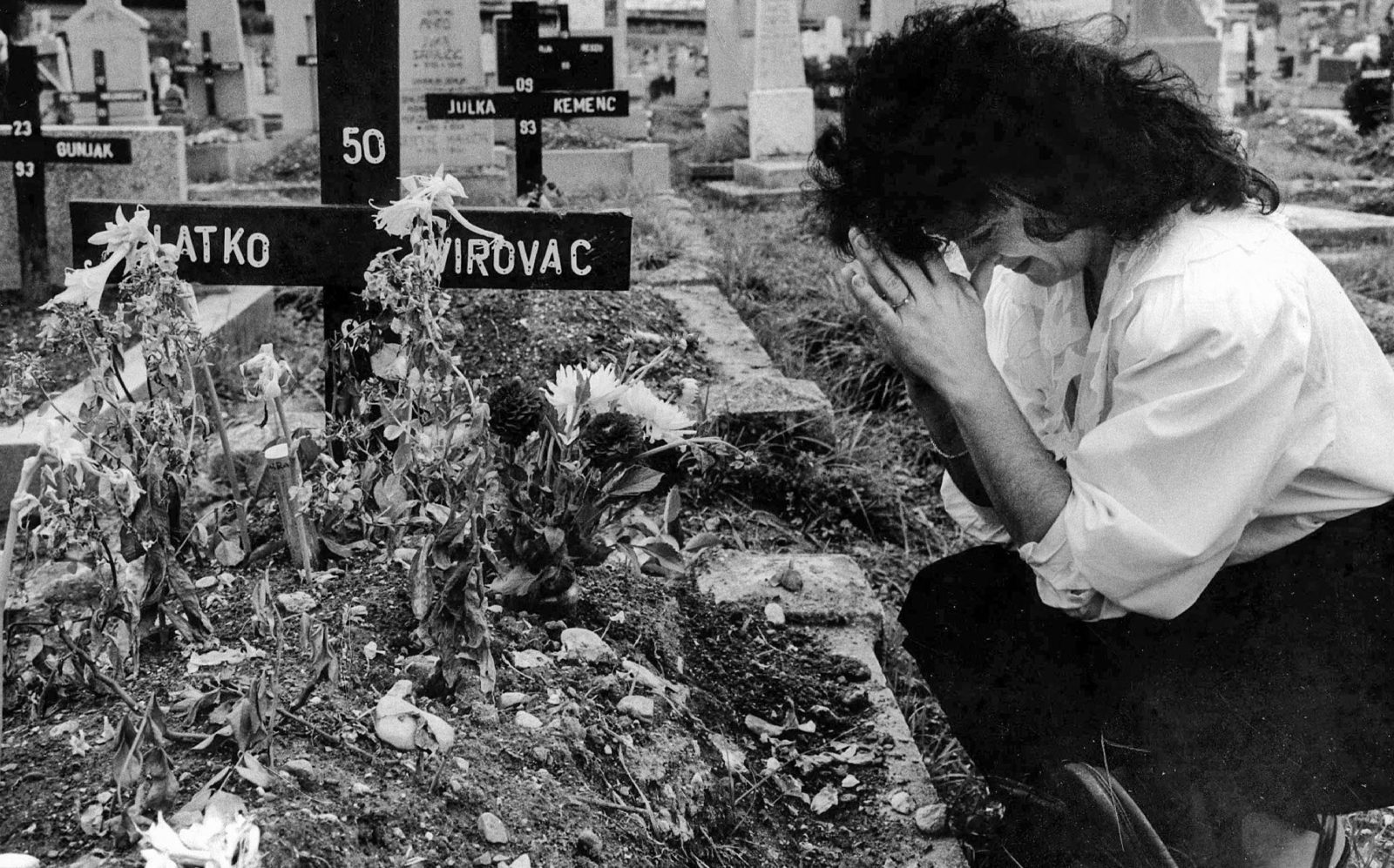 Sarajevo Woman at grave of her husband Summer 1993