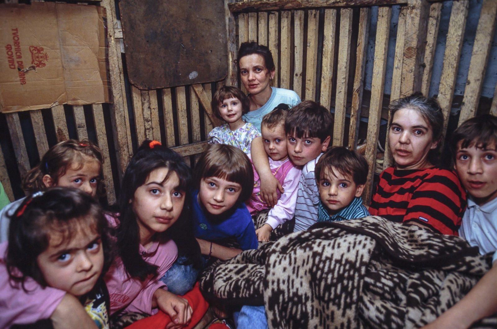 13 Jul 1992, Sarajevo, Bosnia and Herzegovina --- A Bosnian refugee family sleeps in an underground basement, sheltered from bombardments. Thousands of Bosnian and Serb civilians were victims of the Yugoslavian Civil War, which began in 1991 in Bosnia and Herzegovina, in the former Yugoslavia. --- Image by © Patrick Robert/Sygma