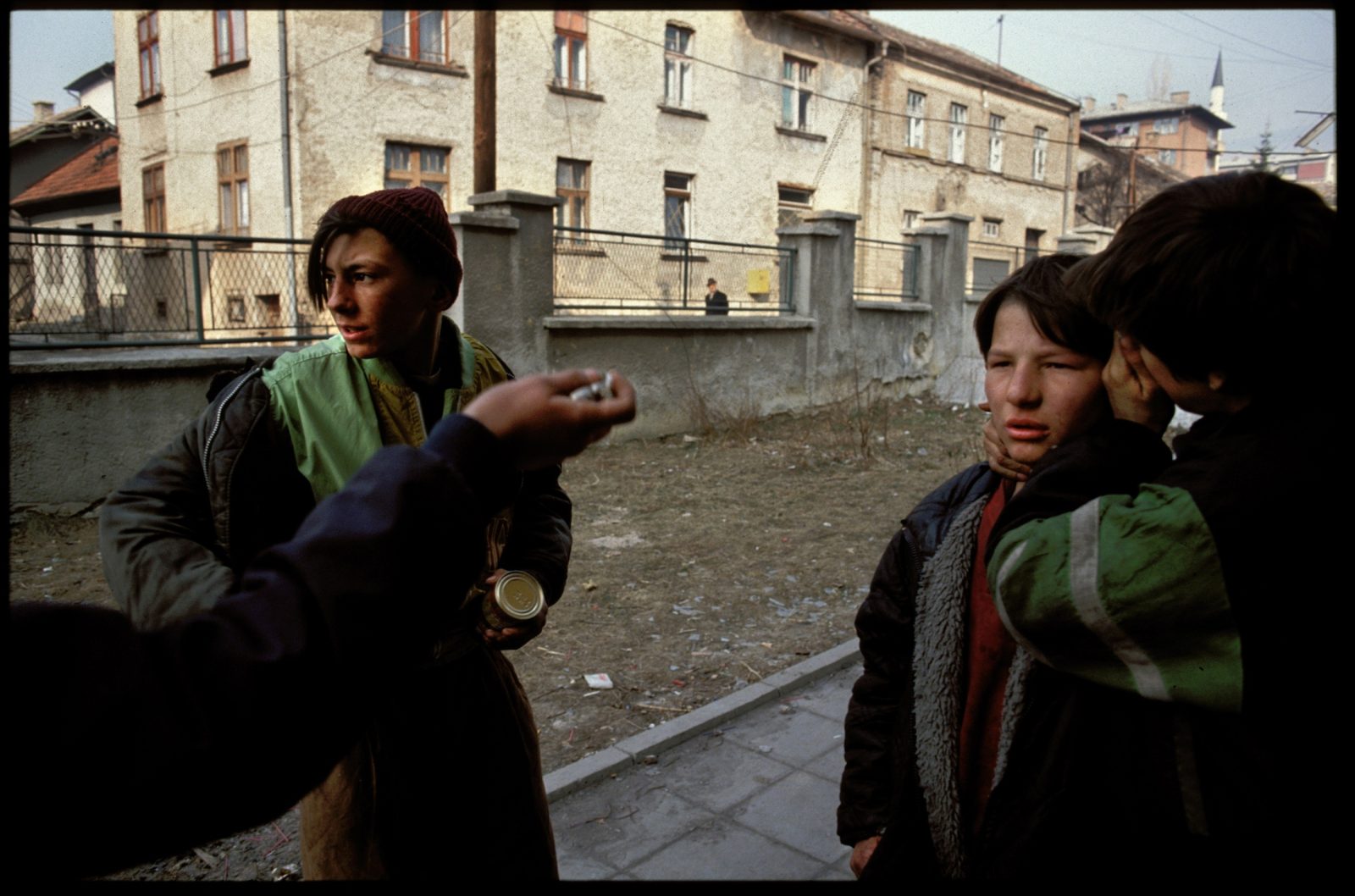 A gang of orphans who steal to survive outside the children's orphanage almost one year into the Serb siege of the city, Sarajevo, Bosnia and Herzegovina, February 1993.