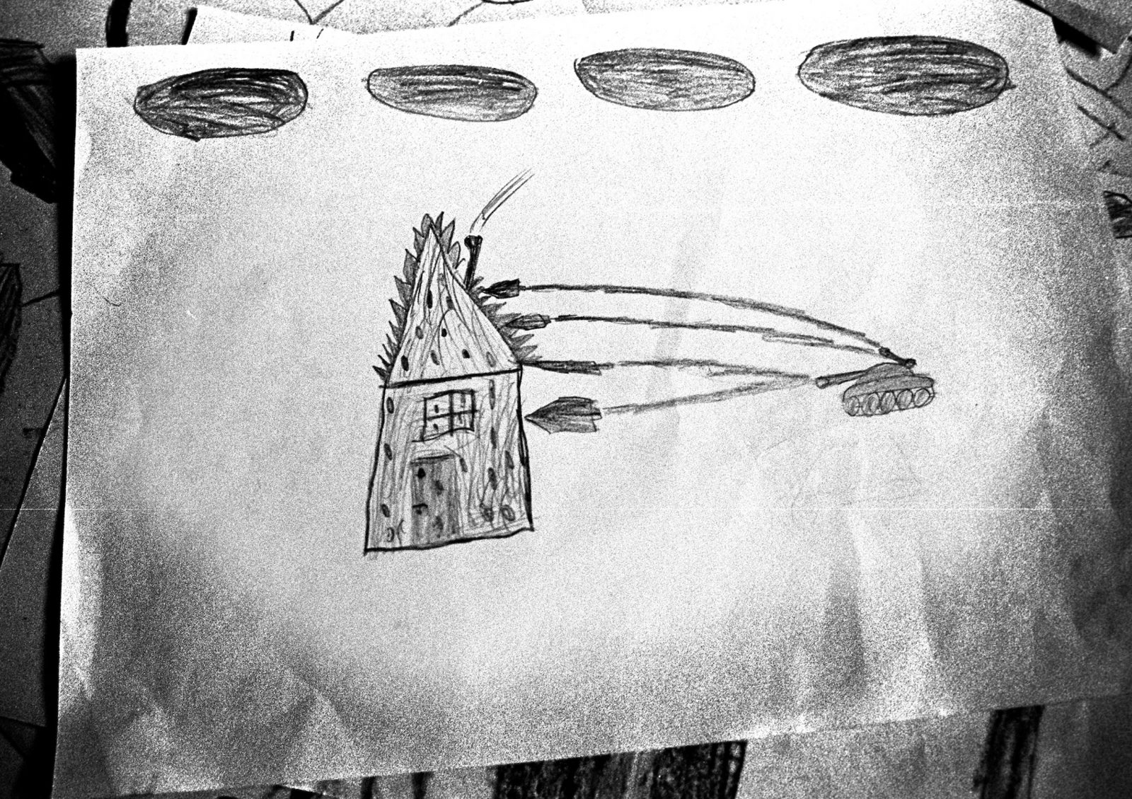 A child's drawing depicts a Serb tank firing at a house, Sarajevo, Bosnia-Herzegovina, February 1993.