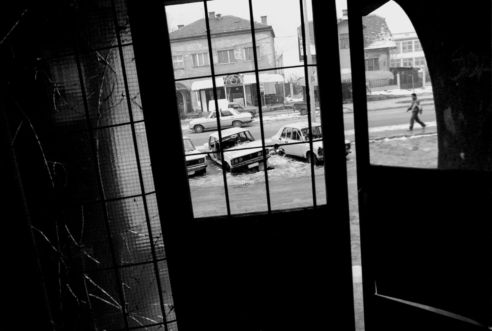 View from a Sarajevo apartment building foyer during the final days of the siege of the city, Sarajevo, Bosnia and Herzegovina, January 1996.