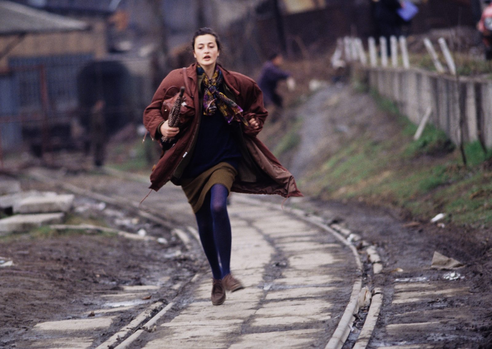 Sanda Skrabić AKA 'Sarajevo Princess' runs to avoid being shot by a Serb sniper during the siege of Sarajevo, Bosnia and Herzegovina, April 1993.