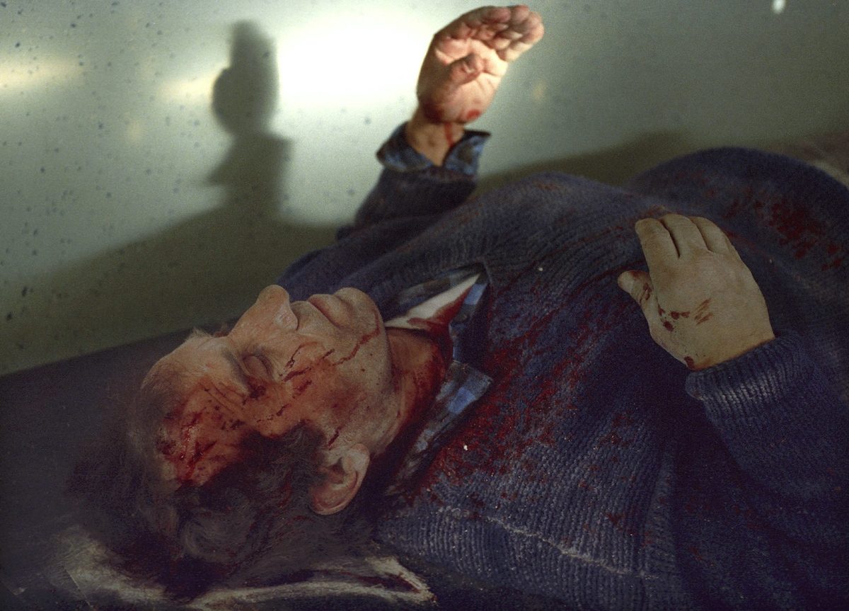 A direct mortar hit on a civilian house rendered multiple wounds to the family,a stranger passing by rescued mother and son and rushed them to hospital where they are reunited with the grandfather who has shrapnel wounds to his head and upper torso.The hospital was also coming under attack from the Serbian forces in the mountains.
