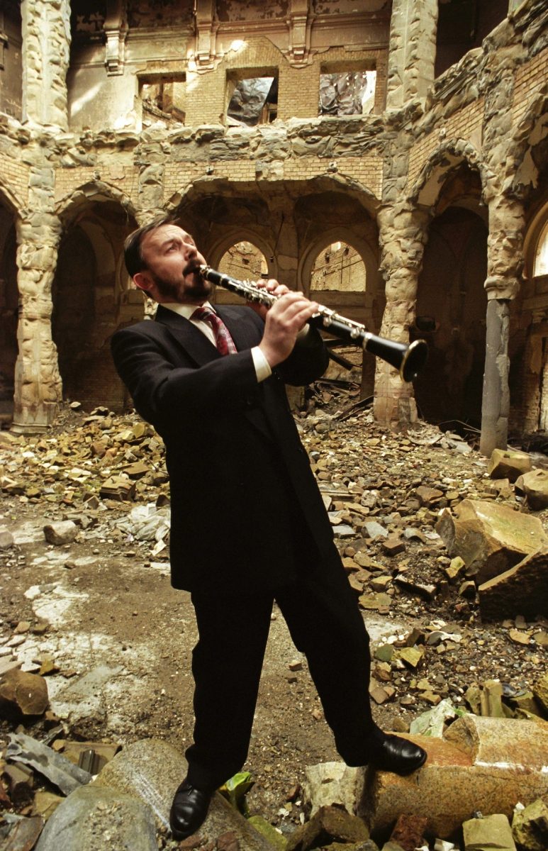 Life really must go on.Resourceful solo clarinetist Emir Nuhanovic plays a Benny Goodman number in the ruins of the Bosnian National Library. He cried when the soldiers drove tanks over his clarinets. “They did it from spite because I deserted with nearly 200 instruments from the barracks music college when war broke out” he said. Mr Nuhanovic had been a member of the Yugoslav army band, which was under Serbian control.