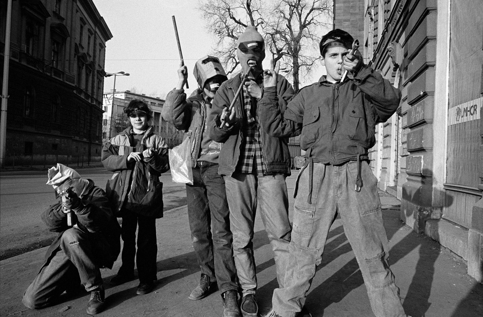 Kids play war during the war, March 1993, Sniper Alley intersection - Sarajevo.